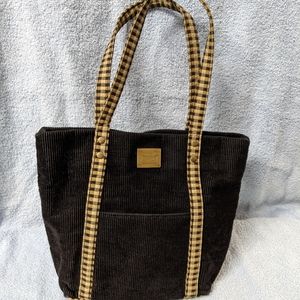Longaberger Black Corduroy, plaid straps, bottom, lining and trim.
